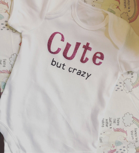 "Cute but crazy" baby grow
