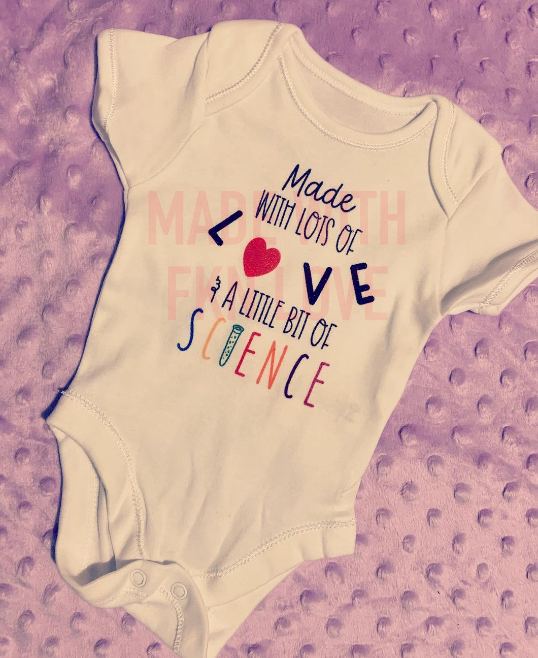 Made with lots of love and a little bit of science baby grow
